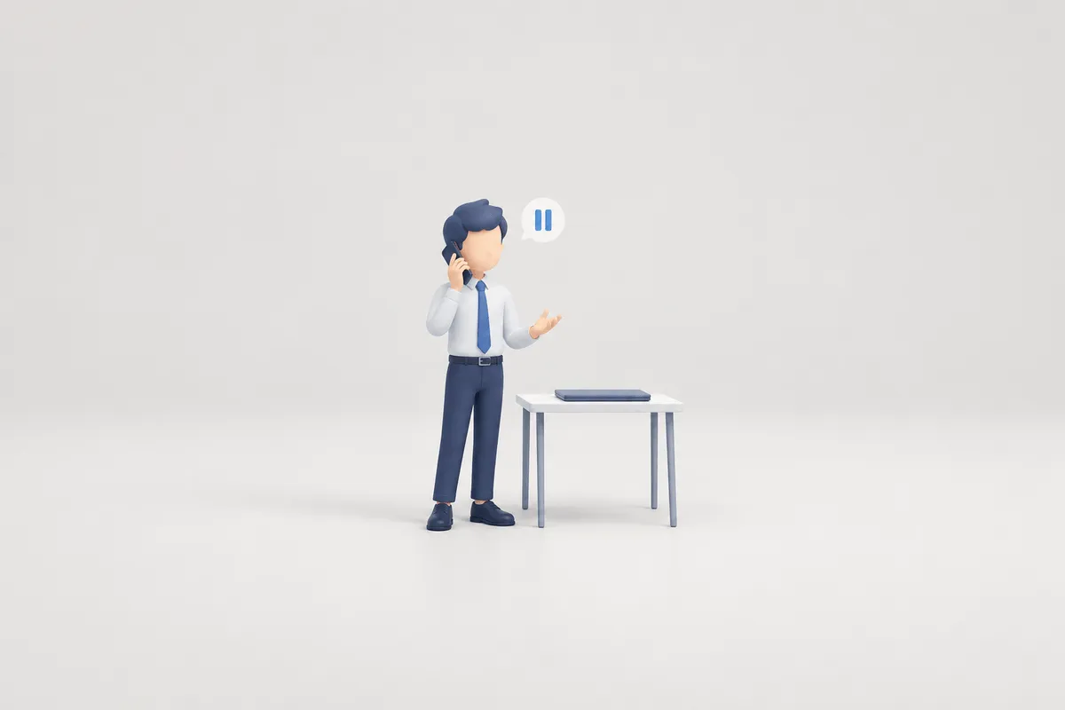 送信を止めた端末の横で担当者が管理者へ連絡する落ち着いたオフィスの場面